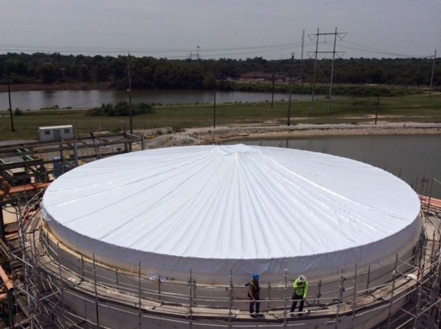 Large tank containment shrink wrapping services